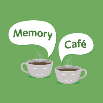 Two coffee cups with smiley faces, with the words Memory Café above. Green background.